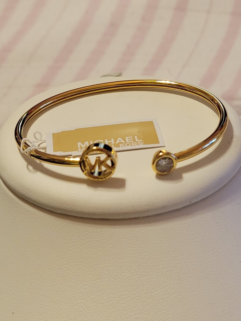 Michael Kors Gold Open Bangle with MK Logo and Crystal End